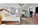 Spacious main bedroom with king-size bed and ample natural light at 97 Grayson New Hope Rd, Grayson, GA 30017