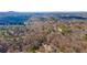 Aerial view of home and surrounding landscape at 1337 Fairfield Dr, Lilburn, GA 30047