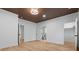Spacious bedroom with wood floors and access to bathroom and closet at 1337 Fairfield Dr, Lilburn, GA 30047