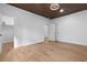 Light-filled bedroom featuring wood flooring and ample closet space at 1337 Fairfield Dr, Lilburn, GA 30047