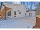 House exterior showcasing a patio and fenced yard at 1337 Fairfield Dr, Lilburn, GA 30047