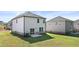 Two-story home with backyard and patio at 2448 Lenox Se Rd, Conyers, GA 30094