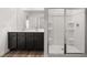 Bathroom with dark vanity, double sinks, and shower at 2448 Lenox Se Rd, Conyers, GA 30094