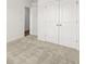Spacious bedroom with double closets and carpet flooring at 2448 Lenox Se Rd, Conyers, GA 30094