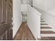 Bright entryway with hardwood floors and staircase at 2448 Lenox Se Rd, Conyers, GA 30094