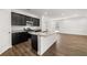 Eat-in kitchen with granite countertops and stainless steel appliances at 2448 Lenox Se Rd, Conyers, GA 30094
