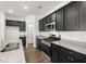 Eat-in kitchen with granite countertops and stainless steel appliances at 2448 Lenox Se Rd, Conyers, GA 30094