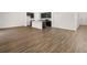 Modern kitchen with dark cabinetry and an island at 2448 Lenox Se Rd, Conyers, GA 30094