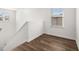Bright landing area overlooking the main floor at 2448 Lenox Se Rd, Conyers, GA 30094