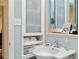 Small bathroom with a sink and storage cabinet at 1452 Merriman Ne Ln, Atlanta, GA 30324
