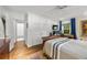 Bright bedroom with hardwood floors and private bathroom access at 1452 Merriman Ne Ln, Atlanta, GA 30324