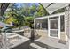 Spacious deck with outdoor kitchen and screened porch access at 1452 Merriman Ne Ln, Atlanta, GA 30324