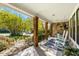 Spacious front porch with wooden columns and a view of the yard at 1452 Merriman Ne Ln, Atlanta, GA 30324