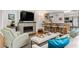 Bright living room featuring a fireplace and an adjacent kitchen area at 1452 Merriman Ne Ln, Atlanta, GA 30324