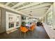 Large screened porch with dining area and access to the backyard at 1452 Merriman Ne Ln, Atlanta, GA 30324