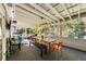 Relaxing screened porch with dining area and seating at 1452 Merriman Ne Ln, Atlanta, GA 30324