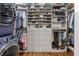 Large walk-in closet with ample shelving and drawers at 1452 Merriman Ne Ln, Atlanta, GA 30324
