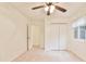 Bedroom with ceiling fan, bright window and double door closet at 1195 Fielding Way, Marietta, GA 30068