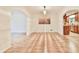 Open dining room with hardwood floors and access to kitchen area at 1195 Fielding Way, Marietta, GA 30068
