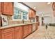 Updated kitchen with granite counters, tile backsplash, and stainless appliances at 1195 Fielding Way, Marietta, GA 30068