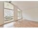 Bright living room with hardwood floors, vaulted ceilings, and large windows, providing ample light at 1195 Fielding Way, Marietta, GA 30068