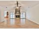 Living room with hardwood floors, fireplace, and a mounted television at 1195 Fielding Way, Marietta, GA 30068