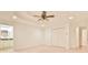 Spacious main bedroom with ensuite bath, tray ceiling, ceiling fan, and double closet at 1195 Fielding Way, Marietta, GA 30068