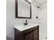 Modern bathroom with dark vanity and white subway tile at 1573 Deerwood Ln, Acworth, GA 30102