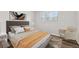Bedroom with queen bed, hardwood floors, and window at 1573 Deerwood Ln, Acworth, GA 30102