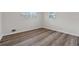 Empty bedroom featuring wood-look floors at 1573 Deerwood Ln, Acworth, GA 30102