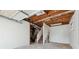 Unfinished garage with stairs leading to the basement at 1573 Deerwood Ln, Acworth, GA 30102
