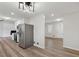 Open concept kitchen and dining area with hardwood floors at 1573 Deerwood Ln, Acworth, GA 30102