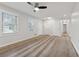 Spacious living area with hardwood floors and access to other rooms at 1573 Deerwood Ln, Acworth, GA 30102