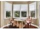 Cozy breakfast nook with bay window and a charming table at 3 Highland Park Ne Ln, Atlanta, GA 30306