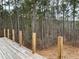 Deck overlooks a beautiful wooded area at 515 Penny Ln, Loganville, GA 30052