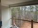 View from a deck under construction, overlooking a wooded area at 515 Penny Ln, Loganville, GA 30052