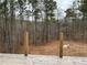 Deck overlooking wooded area, offering a peaceful and private setting at 515 Penny Ln, Loganville, GA 30052
