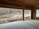 Unfinished three-car garage with wooded views at 515 Penny Ln, Loganville, GA 30052