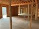Open floor plan great room framing in new construction at 515 Penny Ln, Loganville, GA 30052