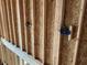 Interior framing with exposed wiring at 515 Penny Ln, Loganville, GA 30052