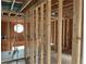 Interior framing of a room in a new house under construction at 515 Penny Ln, Loganville, GA 30052
