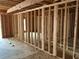 Interior framing of a room in a new house under construction at 515 Penny Ln, Loganville, GA 30052