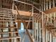 Open staircase structure during home construction at 515 Penny Ln, Loganville, GA 30052