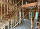 View of a staircase under construction in a new home at 515 Penny Ln, Loganville, GA 30052