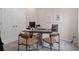 Home office with desk, chairs, and built-in storage at 233 Lytham Se Dr, Mableton, GA 30126