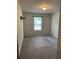 Cozy bedroom with carpet and a window at 416 Robin Hill Ln, Temple, GA 30179