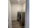 Laundry room with washer, dryer and shelving at 416 Robin Hill Ln, Temple, GA 30179