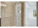 Bathroom features modern tiled shower and bright natural light at 250 Lytham Se Dr, Mableton, GA 30126