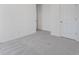 View of the bedroom with neutral carpet and white doors at 250 Lytham Se Dr, Mableton, GA 30126