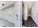 Inviting entryway with hardwood floors, access to garage, and staircase at 250 Lytham Se Dr, Mableton, GA 30126